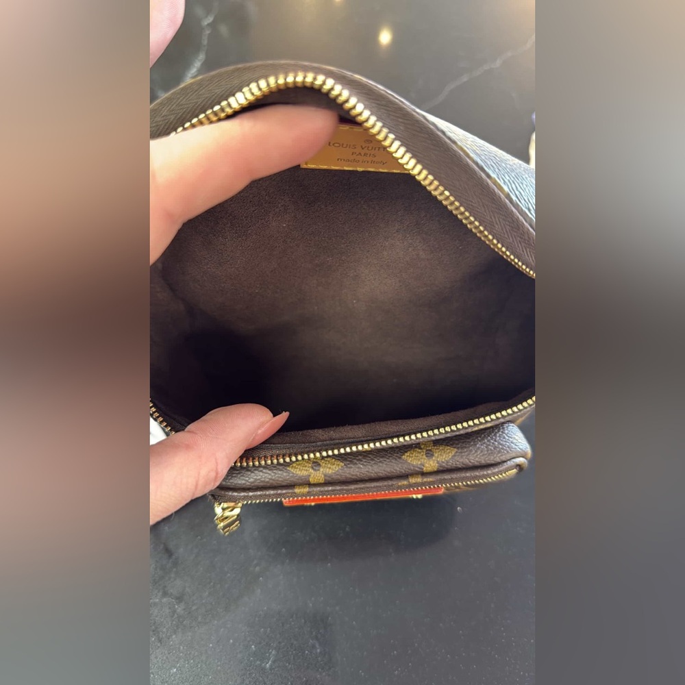 Louis Vuitton Mini Bumbag in Monogram Canvas Retails: $2160 - Picture 10 of 11